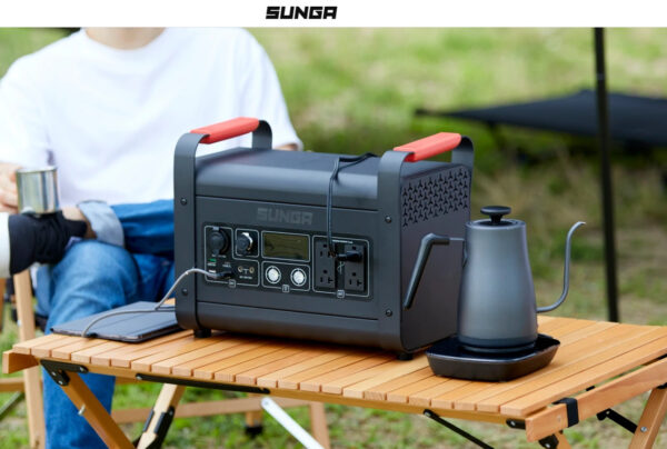a-man-relaxing-next-to-a-portable-power-supply