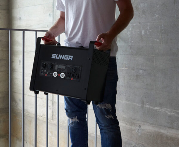 man-carrying-a-portable-power-supply