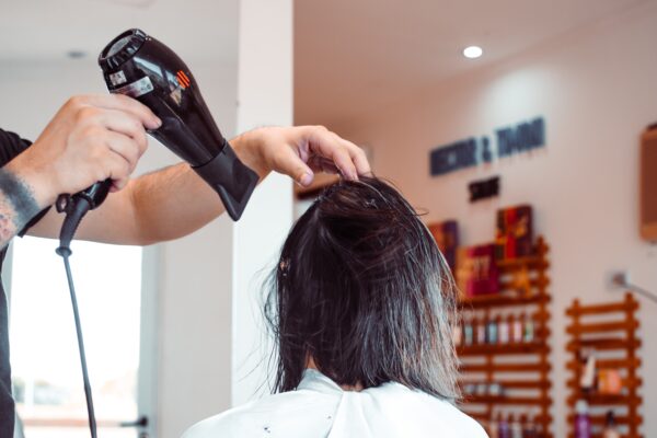 a-woman-who-blow-dries-her-hair