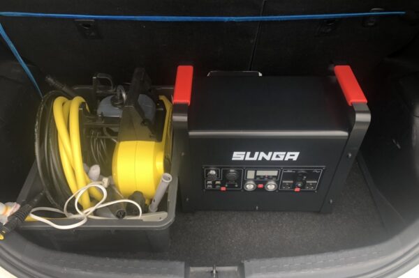 Portable-power-supply-and-high-pressure-washer-in-car
