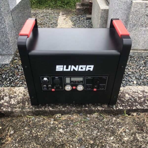 Portable-power-source-placed-in-front-of-the-grave