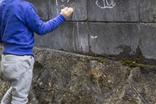 a-child-who-scribbles-on-a-wall