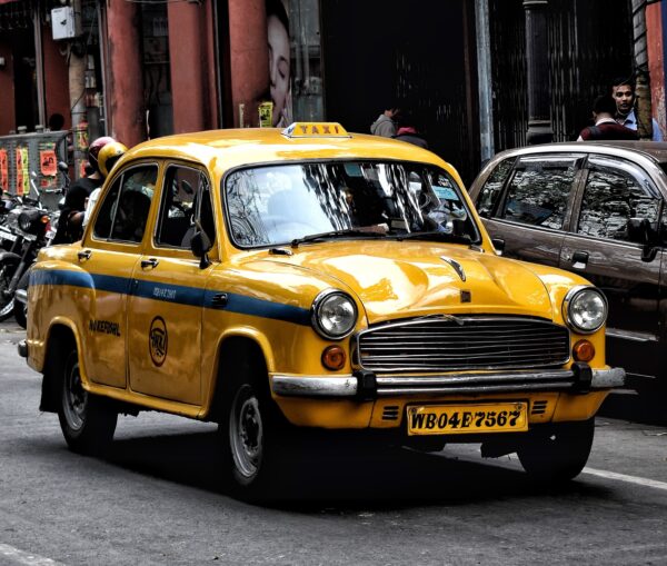 a-yellow-taxi-running-through-the-city
